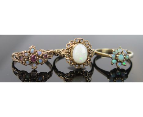 Three 9ct Rings _ Opal Cluster Ring (size I), together with another (size I) and a single stone (size J.5), 6.1g