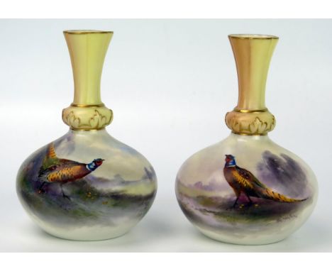 Pair of Royal Worcester Jars. Stinton Vases of baluster form, decorated with pheasants, blush and gilded neck, black mark 190