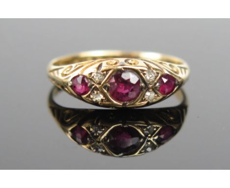 An Antique Ruby, Diamond and 18ct Gold Ring, 4.2mm central circular stone, size J, 2g, Birmingham 1903