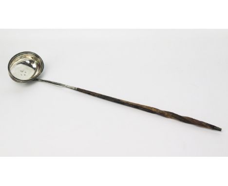 A George III silver toddy ladle, maker Edward Mayfield, London 1806, the oval bowl with reeded border, mounted in a spiral tw