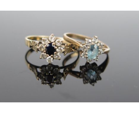 An Aquamarine and CZ 9ct gold ring together with a blue and white stone 9ct gold ring, ring size approximately U,(2).