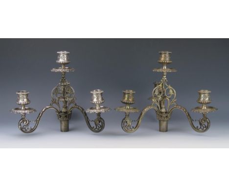 A pair of Victorian silver three branch candelabra fittings, maker John, Edward, Walter and John Barnard, London, 1868, with 