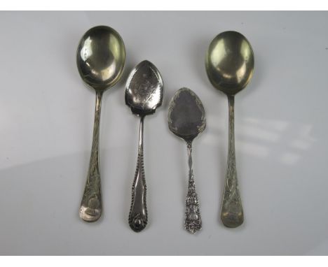 A Victorian silver preserve spoon, maker Levi &amp; Salaman, Birmingham, 1898, together with three plated spoons. 