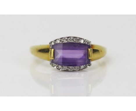 Amethyst and Diamond Dress Ring in an 18ct hallmarked setting, 10x7mm slice cut amethyst, size P.5, 3.5g 
