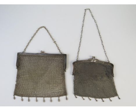 An American silver plated mesh evening bag together with a white metal mesh evening bag not marked, (2). 