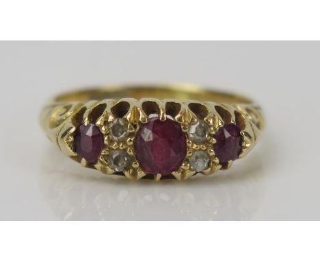 Ruby and Old Cut Diamond Ring in an 18ct gold setting, central stone 4.7x4.1mm, size M.25, 4.4g 