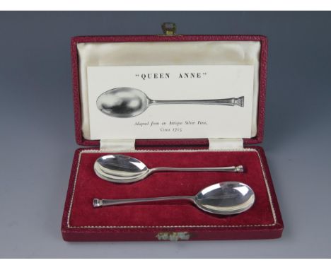A pair of Elizabeth II silver teaspoons in the Queen Anne taste, maker Francis Howard Ltd, Sheffield, 1964, contained in a fi
