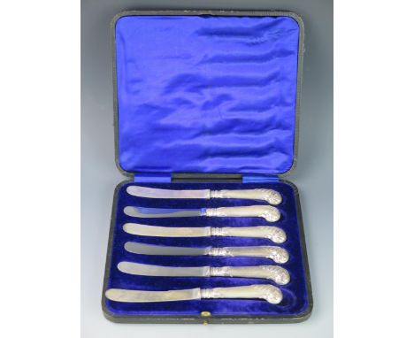 A set of six silver pistol handled butter knives with steel blades contained in a fitted case, 
