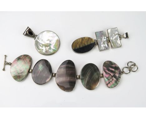 A Mother of Pearl and White Metal Designer Bracelet and Two Pendant, not marked. 
