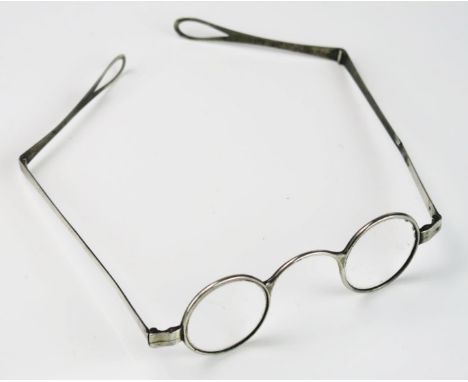 A pair of 19th century silver framed spectacles, unmarked, with folding arms. 