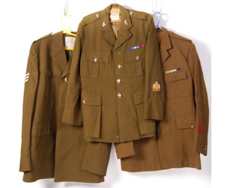 A collection of 3x assorted British military dress uniform jackets to include; RCC Royal Catering Corps No.2 Dress Army 1980 