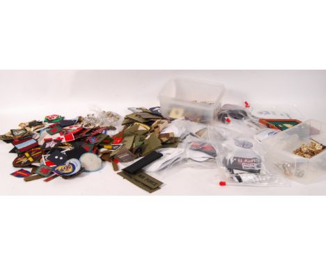 A LARGE collection of reproduction with some original WWII Second World War military uniform patches , badges , buttons , epa