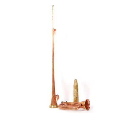 Two early 20th century copper plated brass military issue instruments to include a Bugle with tuning shank marked LP by Potte