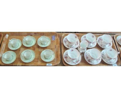 Tray of six Royal Albert bone china 'Lavender Rose' teacups and saucers with milk jug, together with a tray of six Minton bon
