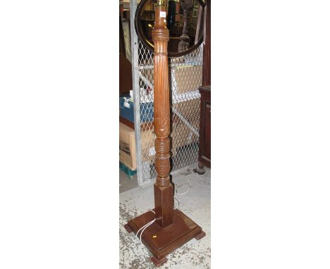20th Century mahogany standard lamp on square stepped base.