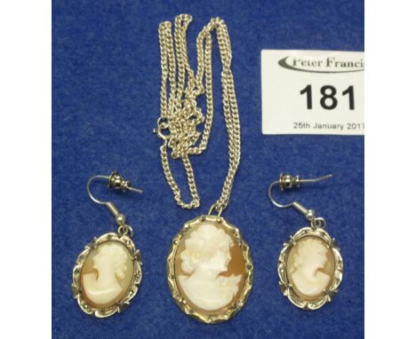 White metal, marcasite set, portrait cameo jewellery garniture, pendant on chain and pair of earrings. 