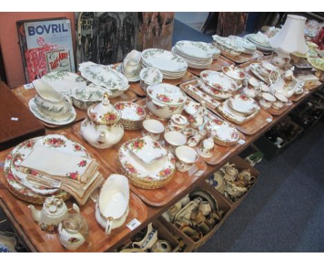 Seven trays of Royal Albert bone china 'Old Country Roses' tea and dinnerware items comprising: teapots; lidded tureens; cups