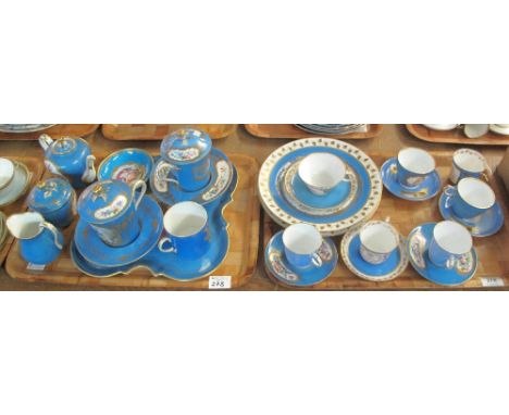 Two trays of assorted French porcelain to include: chocolate cups and saucers on stand; bachelor's teapot; sucrier and cream 