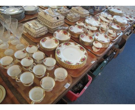 Six trays of Royal Albert bone china 'Old Country Roses' teaware items comprising: tea cups and saucers; various plates; bowl