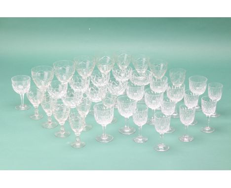 A QUANTITY OF CRYSTAL GLASSWARE
Comprising seven goblet style, seven liqueur and seven wine glasses by Thomas Webb, and fifte