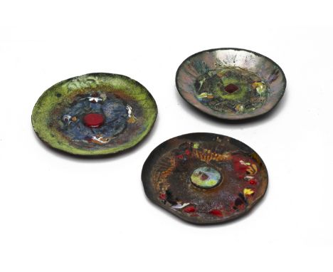 THREE ENAMELLED COPPER DISHES
With various multicoloured decoration
10cm diameter
Condition: All with damage and significant 