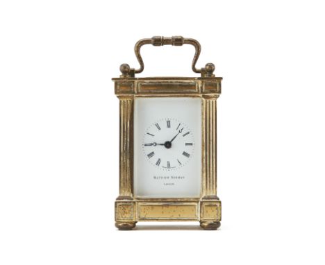 A MATTHEW NORMAN BRASS CARRIAGE CLOCK
The white enamel dial with Roman numeral chapter ring
8.5cm x 6cm x 5cm
Condition: Wear