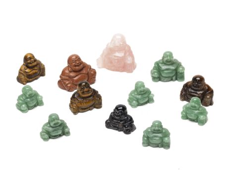 A GROUP OF CARVED HARDSTONE MODELS OF BUDDHA
In various stones including tiger's eye; rose quartz etc
Largest item 6cm high
C