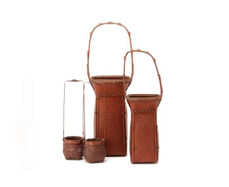 A GROUP OF FOUR JAPANESE IKEBANA FLOWER BASKETS
With two larger similar examples, and a pair of small examples with tall hand