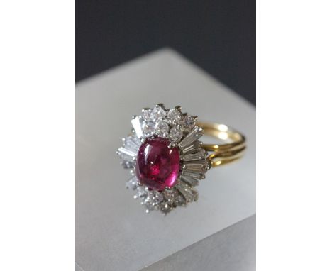 18ct Yellow gold ruby & diamond oval cluster ring with one cabochan cut ruby stone and 14 diamonds tapered baguette cut