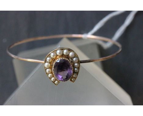 Victorian gold bangle with amethyst & pearl horseshoe to centre which unscrews to fit on hat pin