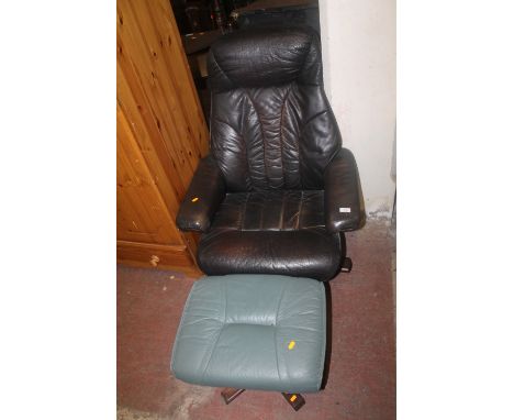 A STRESSLESS TYPE ARMCHAIR AND A STOOL  (2)