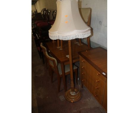 A RETRO STANDARD LAMP WITH SHADE