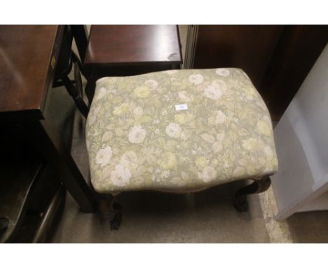 AN ANTIQUE MAHOGANY STOOL