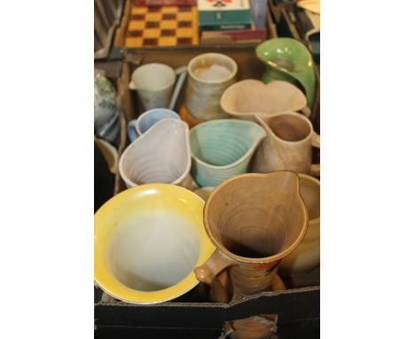 A TRAY OF DECO STYLE CERAMIC JUGS AND VASESª