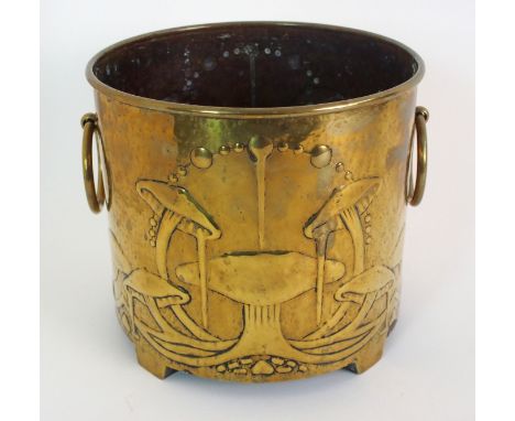 A Scottish Arts and Crafts brass planter, by Marion Henderson Wilson (1869-1956) cylindrical-form mounted with two loop handl