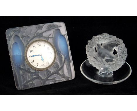 A Rene Lalique "Inseperables" moulded opalescent glass desk clock and Lalique moulded frosted and clear glass pin dish the cl