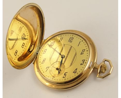 A 14ct Art Deco pocket watch with a gold coloured dial black Arabic numerals, subsidiary seconds dial and a Greek key pattern