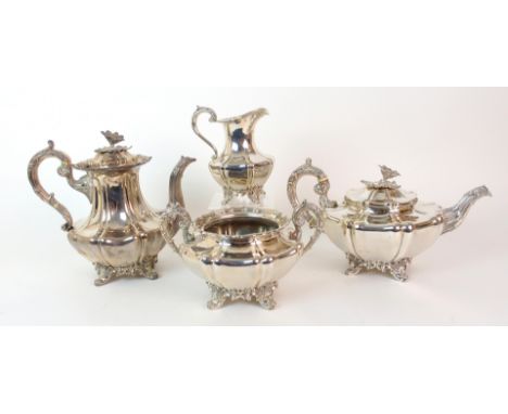 A three piece Indian silver tea service by Hamilton & Co., Calcutta circa 1840 in the rococo style with flowerhead finial, le