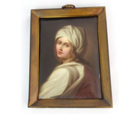 A Continental painted porcelain portrait plaque rectangular plaque depicting a female overlooking her shoulder, within brass 