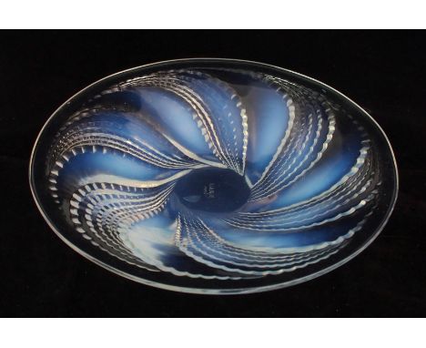 A Rene Lalique "Fleurons" pattern moulded opalescent glass plate circa 1935, shallow round plate with moulded swirling patter