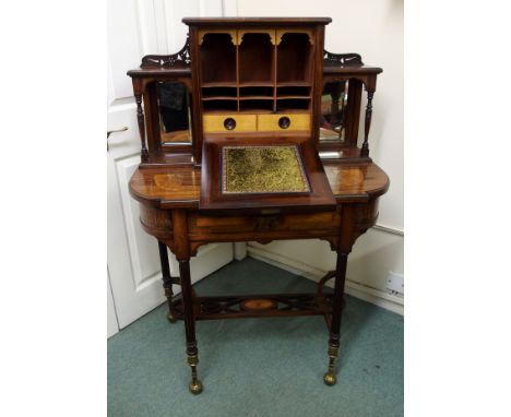 A Victorian rosewood and satinwood inlaid ladies writing deskthe superstructure with hinged door inlaid with ribbon tied swag