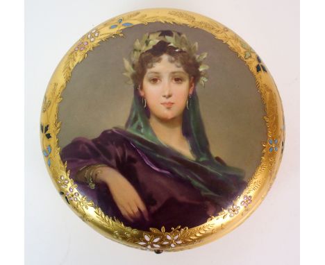 A Royal Vienna painted and enamelled porcelain table casket round box with gilt ground, hinged lid centred with portrait of a