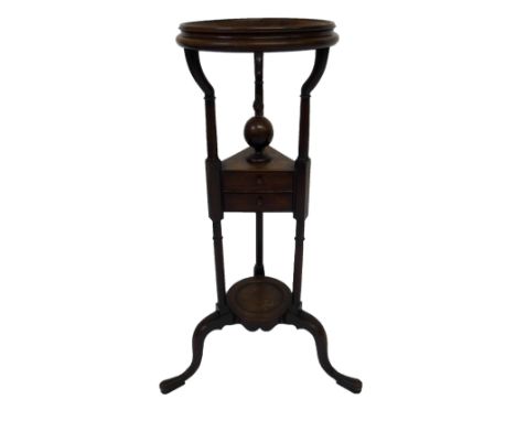 A George III mahogany washstand the basin holder above covered jar and two triangular drawers above the ewer stand and on scr