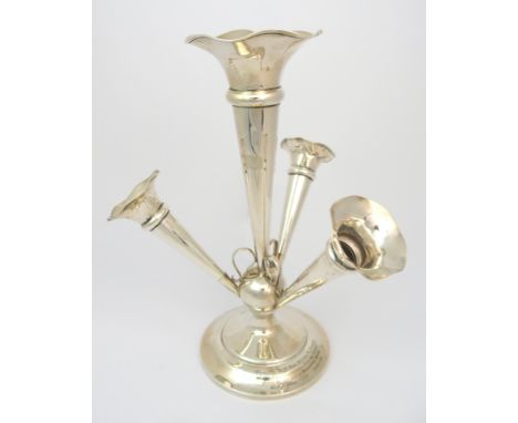 A silver presentation epergne maker's mark and town mark indistinct, probably Birmingham 1918, the integral central trumpet s