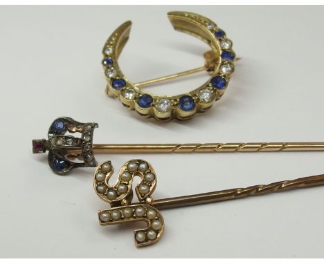 A 9ct sapphire and diamond crescent moon brooch the sapphires of a good cornflower blue colour and brilliant cut diamonds to 