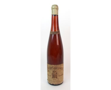 A bottle of Rudesheimer, 1929 label reads "Rudesheimer Produce of Germany shipped and bottled by Charles Ellis & Co. London E