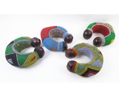 BAMOUN BEADED DOWRIE GIFTS,  ceramic clad with colourful beads, each approx 22cm x 22cm. (4)