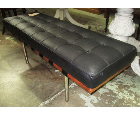 BENCH BARCELONA STYLE, inspired by the design of Mies van der Rohe in black buttoned leather on chromed metal supports, 134cm