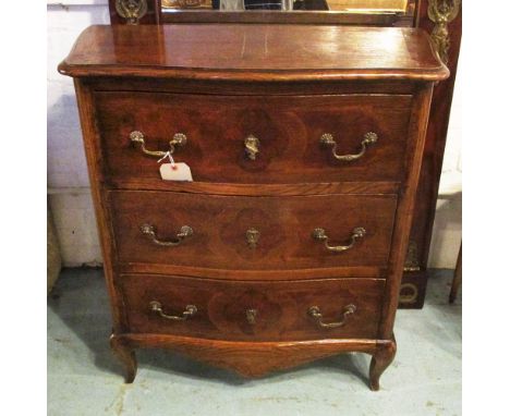 COMMODE, early 20th century Continental oak and fruitwood, of serpentine form with three drawers with parquetry detail, 83cm 