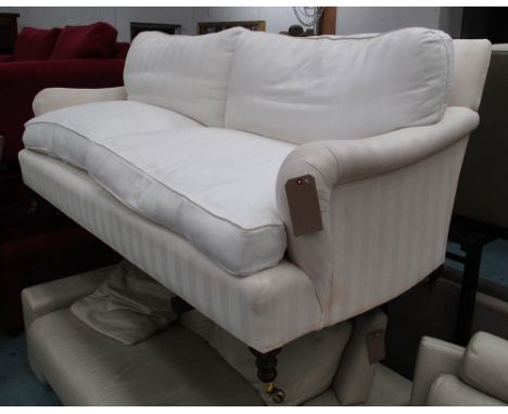 GEORGE SMITH SOFA, Howard style, with cream and ivory striped upholstery on short turned front supports with cappings and cas